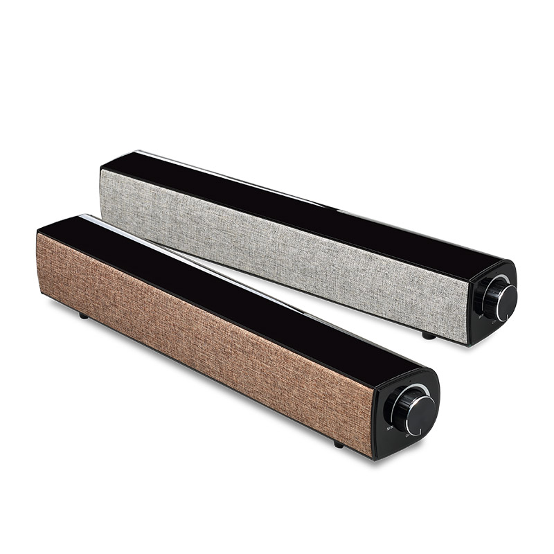 Close-up of control buttons and LED indicators on portable wireless soundbar and subwoofer